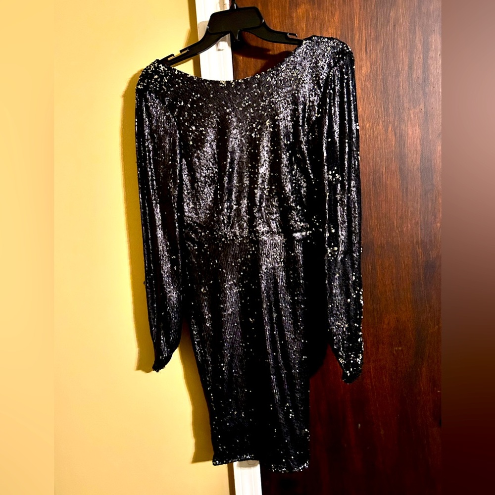 Black mini dress size large worn once good condition.
